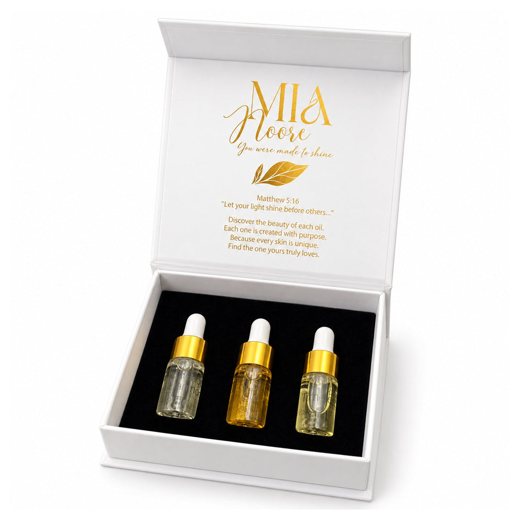 The Mia Noore Discovery Set open, showing sample sizes of Balanced Harmony, Radiant Glow and Timeless natural face oils in gold dropper bottles