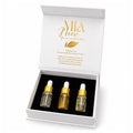 The Mia Noore Discovery Set open, showing sample sizes of Balanced Harmony, Radiant Glow and Timeless natural face oils in gold dropper bottles